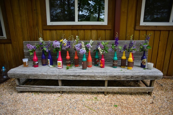 DIY spray painted bright color bottles wedding decorations