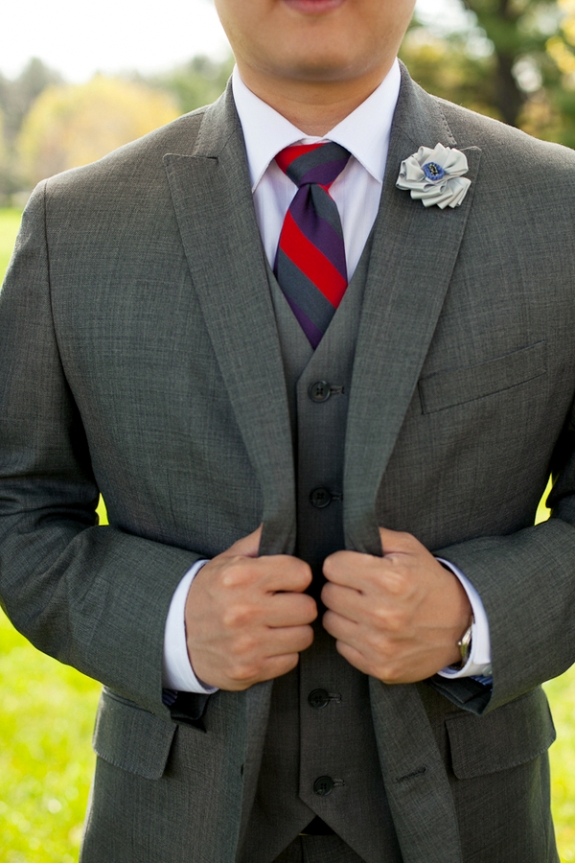 grey suit red striped tie groom