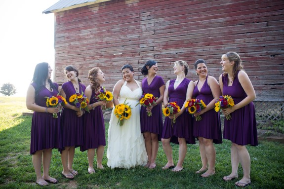 purple bridesmaids dresses sunflower bouqets