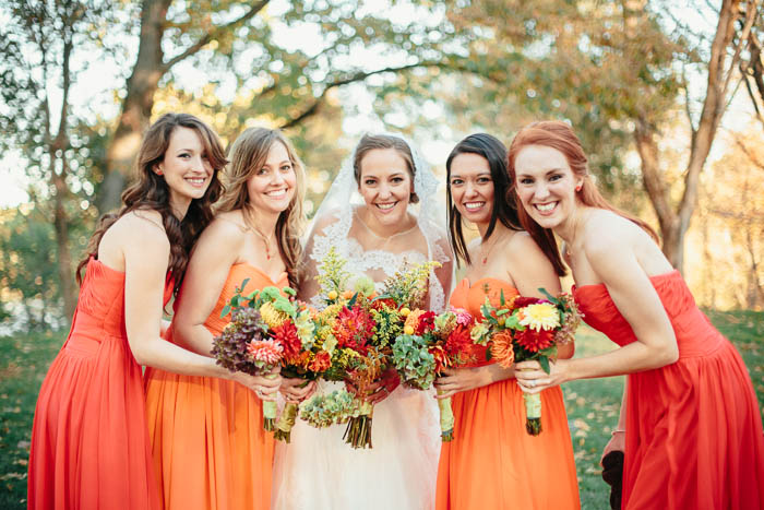 mismatched orange palette bridesmaids dresses